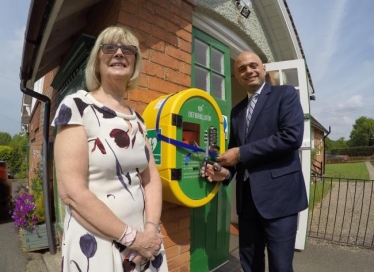Chairman of Finstall Village Hall Management Committee Rosemarie Ryan with MP Sajid Javid